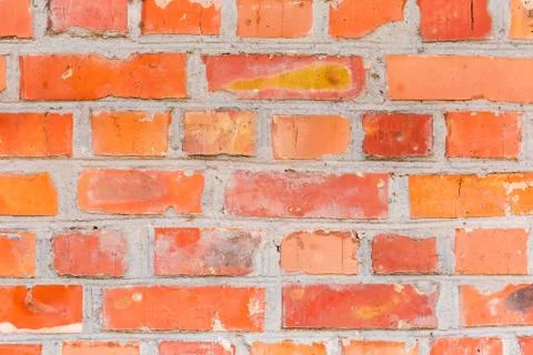 Part of the old red bricks wall close-up, background Stock Photos