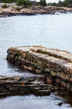 Part of old stone pier Stock Photos