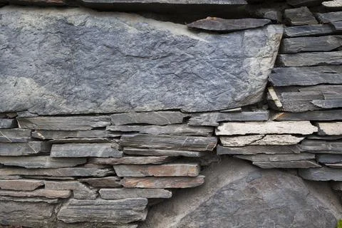 Part of an old stone wall Stock Photos