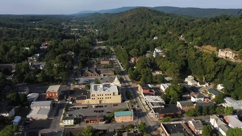 Part one of a fast aerial orbit around Berkeley Springs, West Virginia on Stock Footage 117433504