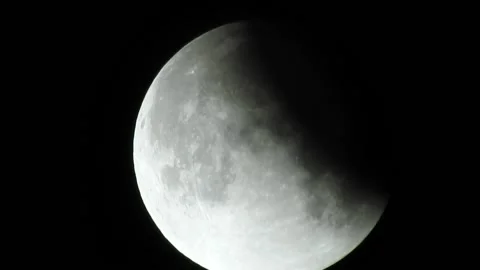A part of the partial lunar eclipse that happened in July 17 2019 in Cairo Stock Footage 191464872