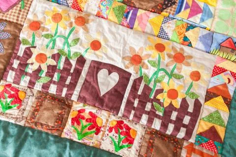 Part of patchwork quilt as background. Handmade Stock Photos