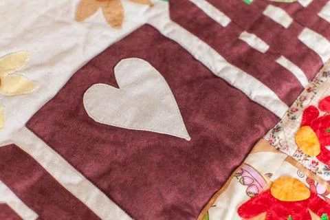 Part of patchwork quilt as background. Handmade Stock-Fotos