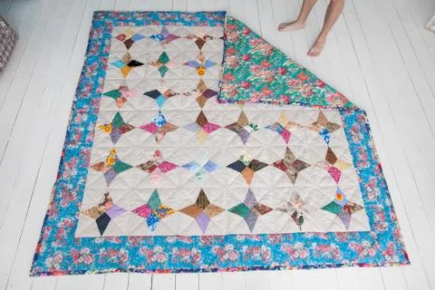 Part of patchwork quilt as background. Handmade Stock Photos