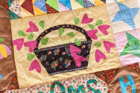 Part of patchwork quilt as background. Handmade Stock Photos