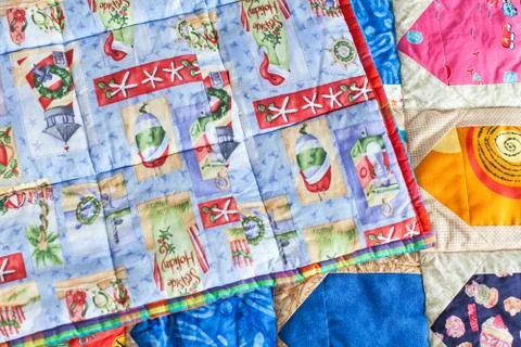 Part of patchwork quilt as background. Handmade Stock Photos