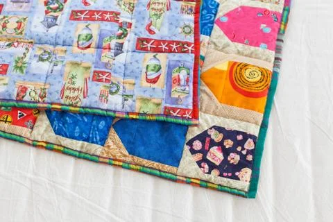 Part of patchwork quilt as background. Handmade Stock Photos