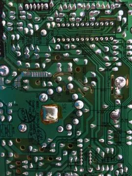 Part of a printed circuit board of a computer. Stock Photos