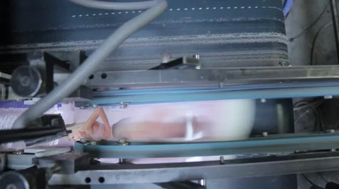 Part of a production line of paper packaging Stock Footage 62348246