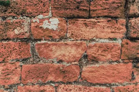Part of a Red Brick Wall. Background or Texture. Surface of ancient obsolete Red 스톡 사진