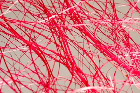 Part of a red wicker straw surface as a background abstraction Background dye Stock Photos
