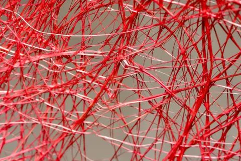 Part of a red wicker straw surface as a background abstraction Background dye Stock Photos