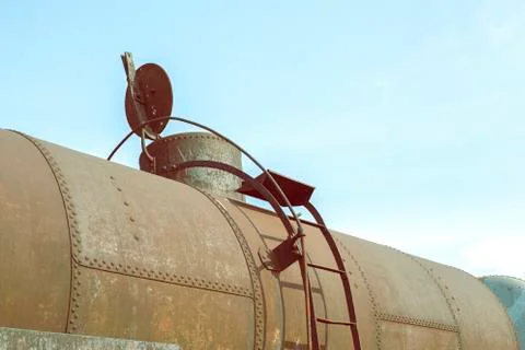 Part of rusty railway container with opened cap Stock Photos