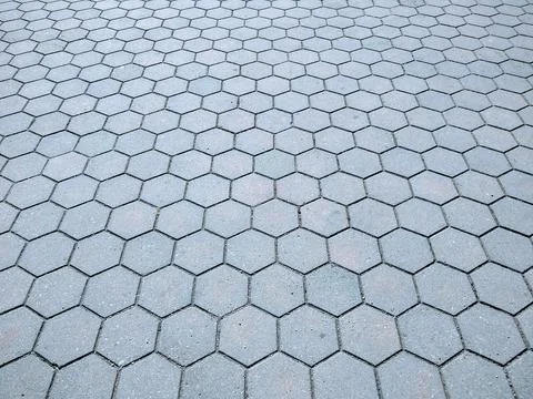 Part of the square paved with hexagonal concrete slabs, close up 写真素材
