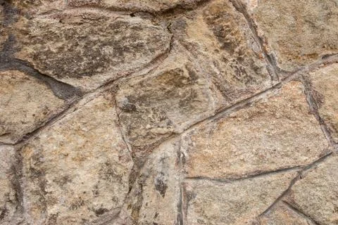 Part of a stone wall, for background or texture. Stock Photos