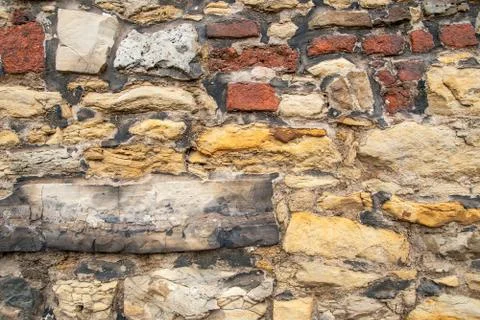 Part of a stone wall, for background or texture. Stock Photos
