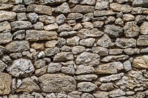 Part of a stone wall, for background or texture. 库存照片