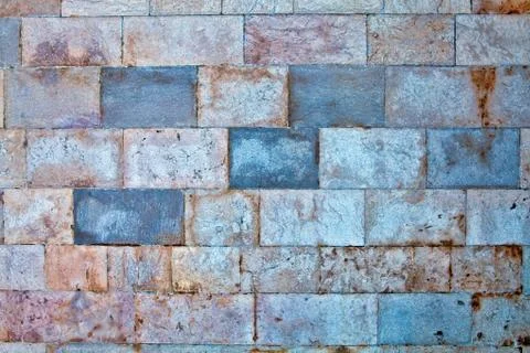Part of a stone wall . Background or texture Stock Photos
