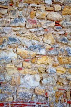 Part of a stone wall . Background or texture Stock Photos