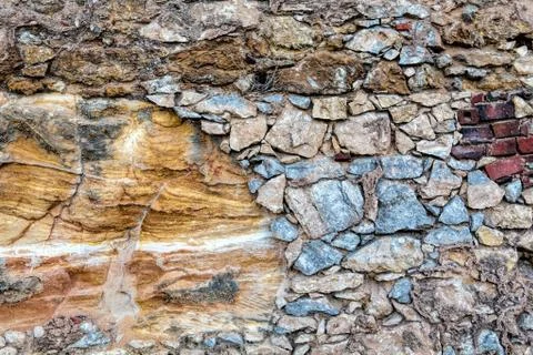 Part of a stone wall, for background or texture Stock Photos