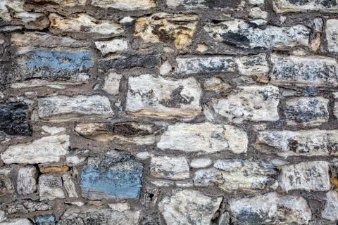 Part of a stone wall, for background or texture Stock Photos