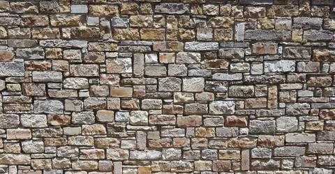 Part of a stone wall, for background or texture. Stock Photos
