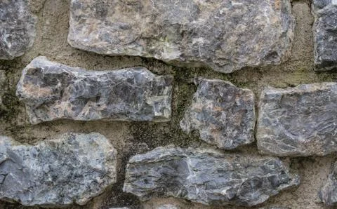 Part of a stone wall, for background or texture. Stock Photos