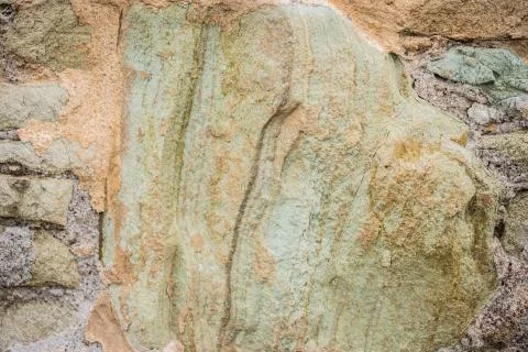 Part of a stone wall, for background or texture. Stock Photos