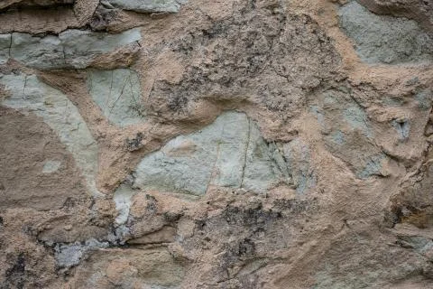Part of a stone wall, for background or texture. Stock Photos