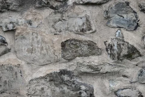 Part of a stone wall, for background or texture. Stock Photos