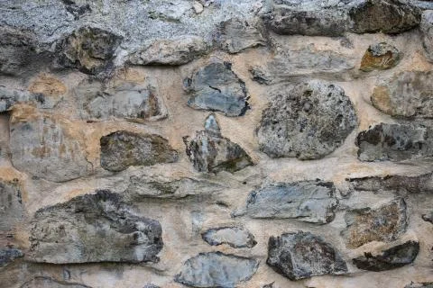Part of a stone wall, for background or texture. Stock Photos