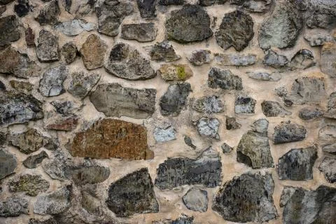 Part of a stone wall, for background or texture. Stock Photos