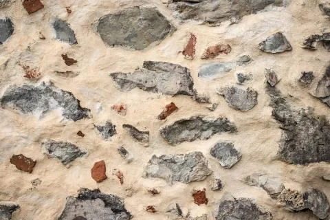 Part of a stone wall, for background or texture. Stock Photos