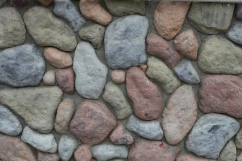 Part of a stone wall, for background or texture Stock Photos
