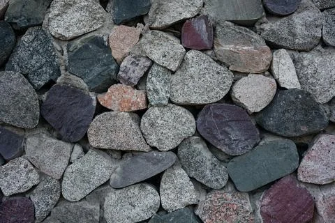 Part of a stone wall, for background or texture. Detail of stone wall Stock Photos