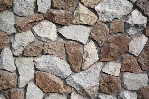 Part of a stone wall for background or texture Stock Photos