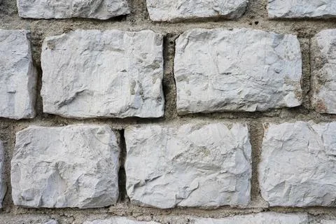 Part of a stone wall, stone texture. Stock Photos