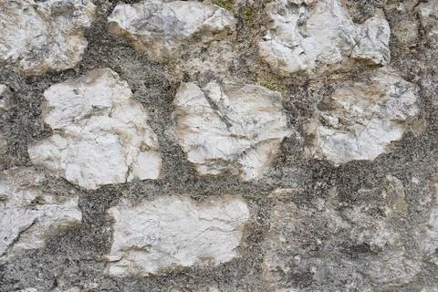 Part of a stone wall, stone texture. Stock Photos
