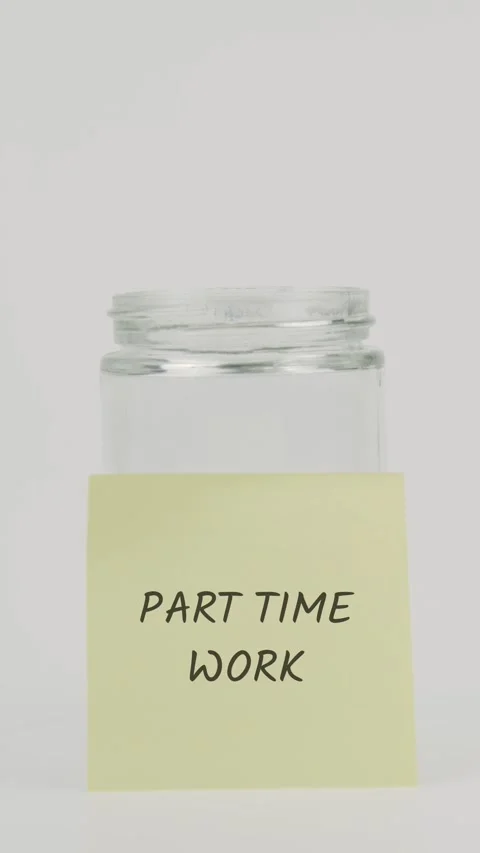 Part time work text or word on yellow sticky note attached to glass jar with Stock Footage 311763378