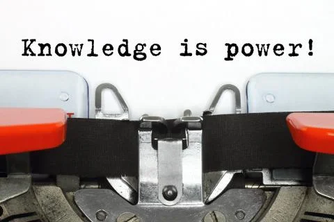 Part of typing machine with typed Knowledge is Power words Stock Photos