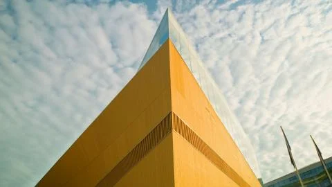 Part of an unusual triangular-shaped structure with a glass roof 库存照片