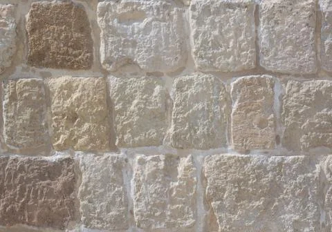 Part of a wall from light stones Stock Photos