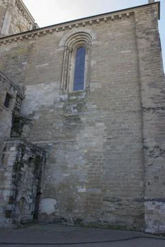 Part of a wall in an old castle, a small arched window Stock-Fotos