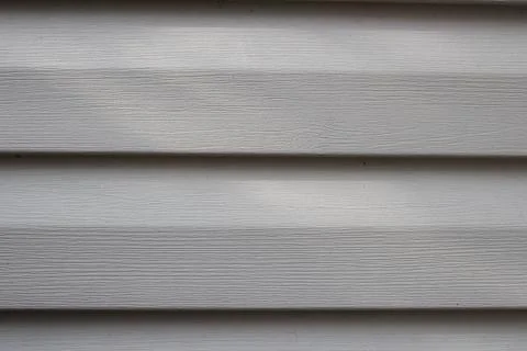 Part of wall from plastic siding close up Stock Photos