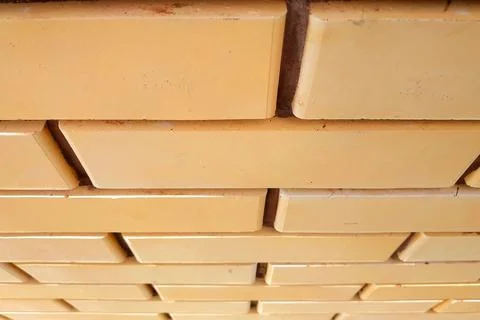 Part of the wall of red facade brick, clearly visible lines. Fotos de archivo