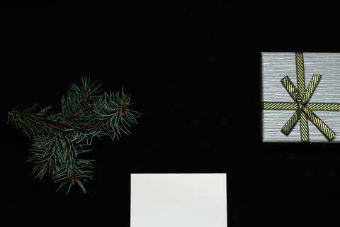 Part of a white Christmas rectangular card on a black background. Christmas p Stock Photos