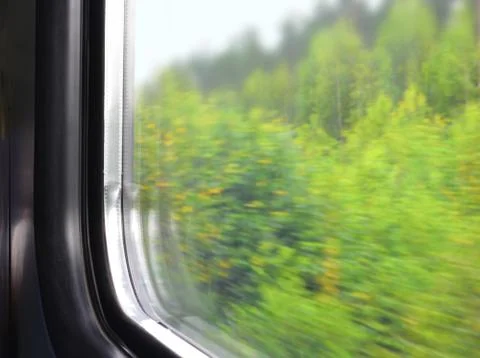 Part of a window of a moving electric train Stock Photos
