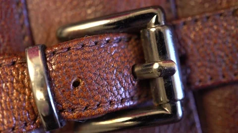 Part of a woman's boot. Slide shot macro texture and buckle fasteners of a le Stock Footage 202887868