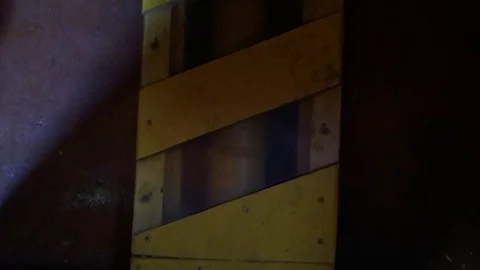 Part of a working boat engine visible through the glass during a storm Stock Footage 80105260