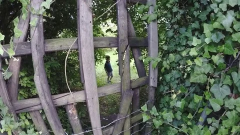 Part2 slow motion, cute boy entering magical garden, running  Stock Footage 82194528